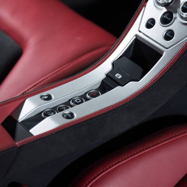 A high angle shot of a black and red car's modern interior - perfect for background